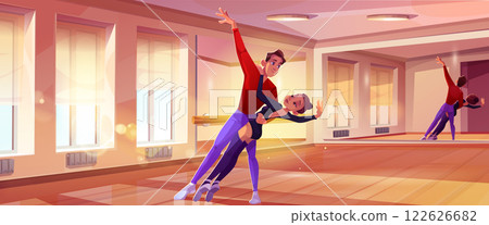 Ballet dancers practicing in sunlit studio 122626682