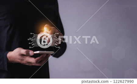Young man hand using smartphone mobile to trade cryptocurrencies online Young man hand using smartphone mobile to trade cryptocurrencies online 122627990