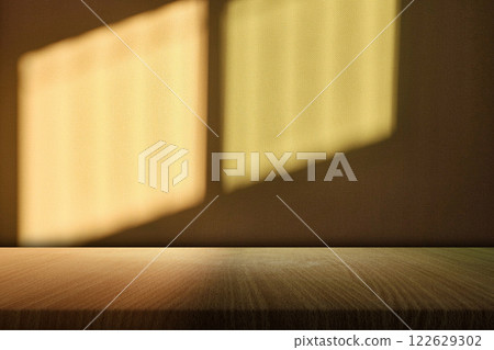 Empty Wood Table with Shadow and Natural Sunset Light on Wallpaper Surface Background 122629302