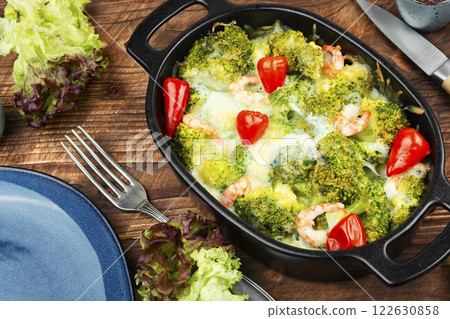Baked gratin of broccoli and shrimps Baked gratin of broccoli and shrimps 122630858