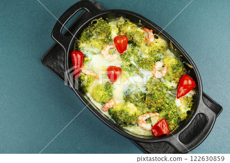 Baked broccoli with shrimp. Baked broccoli with shrimp. 122630859