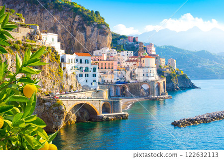 Beautiful view of Amalfi on the Mediterranean coast with lemons in the foreground, Italy Beautiful view of Amalfi on the Mediterranean coast with lemons in the foreground, Italy 122632113