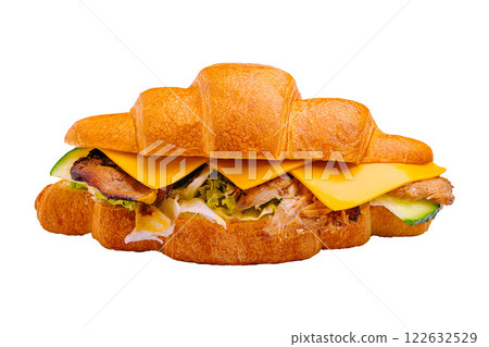 Savory croissant sandwich filled with grilled chicken, cheese, and fresh vegetables ideal for a quick meal Savory croissant sandwich filled with grilled chicken, cheese, and fresh vegetables ideal for a quick meal 122632529