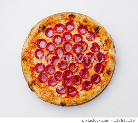 Freshly baked pepperoni pizza ready to be served at a cozy restaurant 122633139