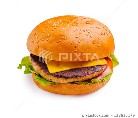 Juicy burger with cheese and fresh vegetables served on a sesame seed bun ready to be enjoyed at lunchtime 122633179