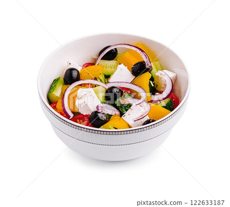 Fresh vegetable and feta cheese salad with olives served in a white bowl Fresh vegetable and feta cheese salad with olives served in a white bowl 122633187