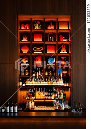 Stylish bar decorated with bottles Stylish bar decorated with bottles 122633229