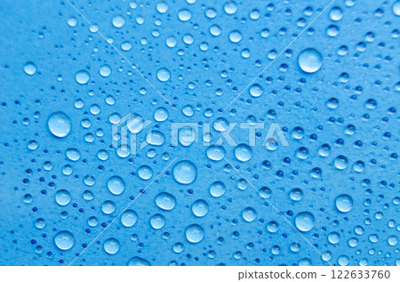 Rain water droplets with ocean blue background. Suitable for wallpaper cover design Rain water droplets with ocean blue background. Suitable for wallpaper cover design 122633760