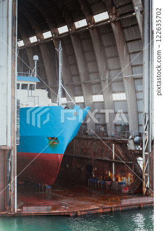 ship in repair yard, dry dock 122635702