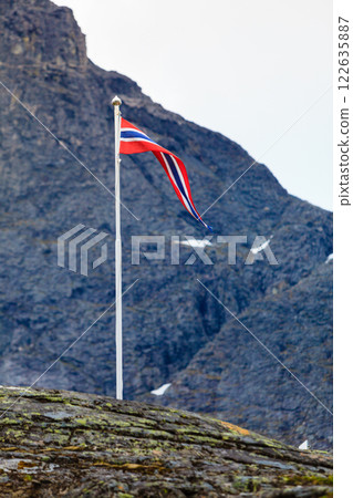 norwegian flag in rocky mountains 122635887