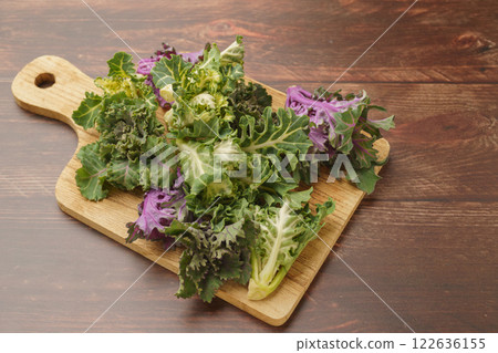 Petit Vert on a cutting board Petit Vert on a cutting board 122636155