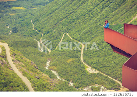 Tourist woman on Trollstigen viewpoint in Norway 122636733