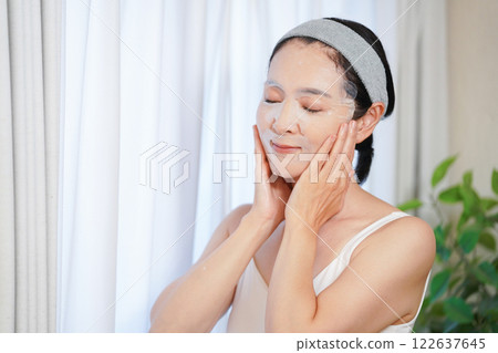 A woman packing A woman packing 122637645