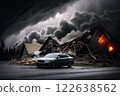 A car is in front of a destroyed house that is on fire 122638562