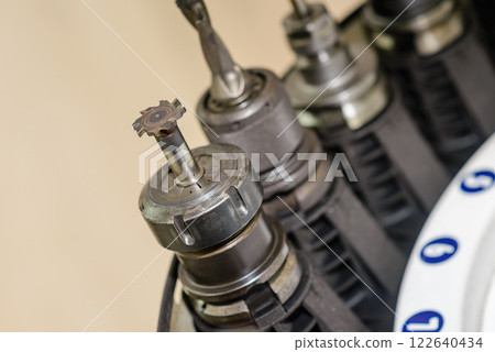 The T-slot tool in the tool magazine of machining center. 122640434