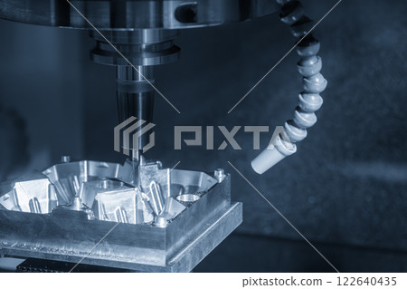 The CNC milling machine cutting blow mold part by solid ball end mill tool. The CNC milling machine cutting blow mold part by solid ball end mill tool. 122640435
