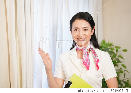 Esthetician smiling with a file 122640745