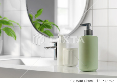 A beautifully designed modern bathroom scene showcasing stylish green soap dispenser mockup 122642292