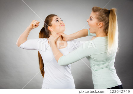 Two agressive women having argue fight 122642749