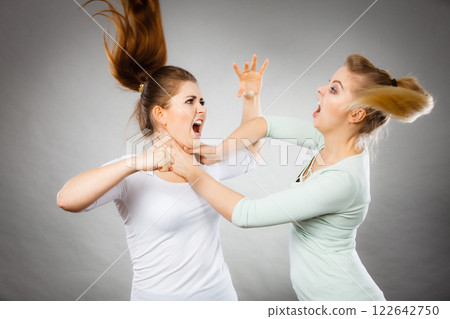 Two agressive women having argue fight 122642750