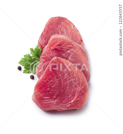 Tuna fish with spice on white backgrounds Tuna fish with spice on white backgrounds 122643557