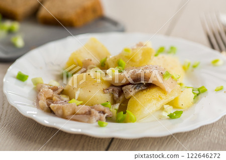 Homemade potatoes with aromatic fish Homemade potatoes with aromatic fish 122646272