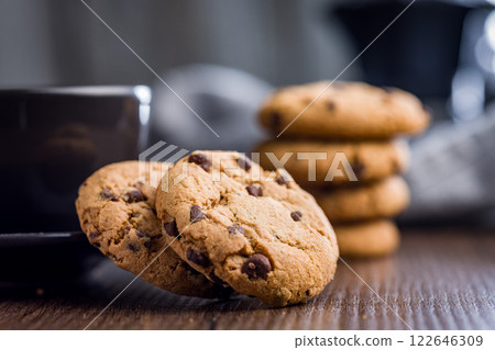Chocolate chip cookies on wooden table. 122646309