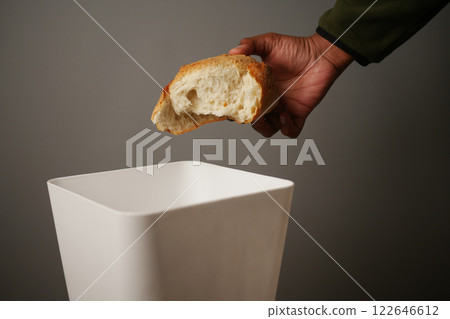 Properly Discarding Unwanted Bread in a Trash Bin for Environmental Care Properly Discarding Unwanted Bread in a Trash Bin for Environmental Care 122646612