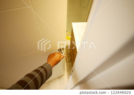 Man's Hand Opening door close up  122646820