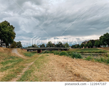 Bridge spans a river in a rural area Bridge spans a river in a rural area 122647187