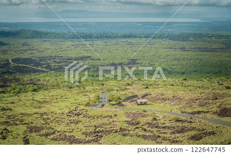 Panoramic view of a road surrounded by vegetation, Landscape of an urban road surrounded by vegetation, View of an urban road surrounded by vegetation 122647745