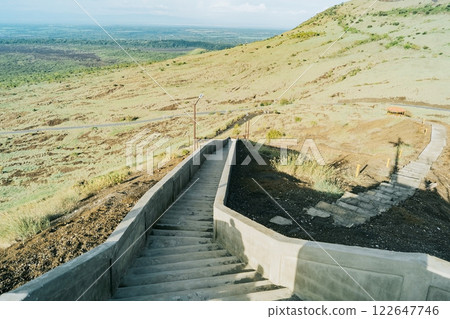 High angle of long concrete stairs outside with nature background. Long concrete stairs on a beautiful hill. Long stairs leading to the viewpoint of the Masaya volcano, Nicaragua High angle of long concrete stairs outside with nature background. Long concrete stairs on a beautiful hill. Long stairs leading to the viewpoint of the Masaya volcano, Nicaragua 122647746
