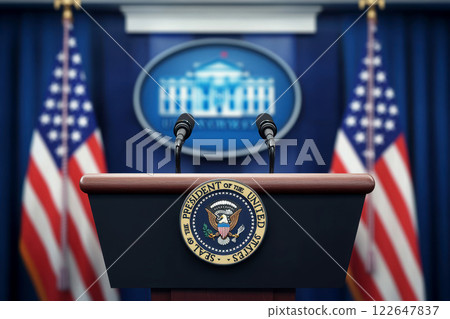 Empty podium with microphones and two American flags in a dark auditorium setting. generative ai 122647837