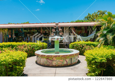 Beautiful water fountain in the Masaya craft market. Masaya craft market fountain 122647860