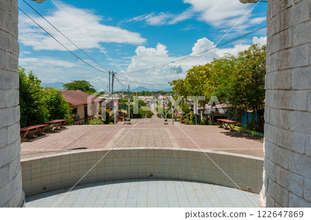 View of the streets of Nagarote with a view of the Momotombo volcano, Nicaragua. Streets of Nagarote with a view of the momotombo volcano on a suny day View of the streets of Nagarote with a view of the Momotombo volcano, Nicaragua. Streets of Nagarote with a view of the momotombo volcano on a suny day 122647869