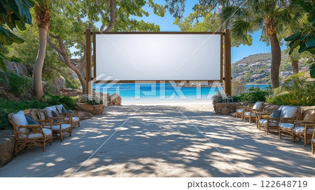 Outdoor movie screening setup at beachside location during sunny day 122648719