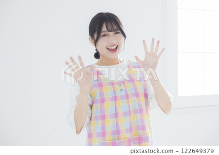 Smiling young nursery teacher Smiling young nursery teacher 122649379