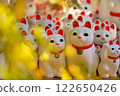 Maneki-neko and yellow leaves at Gotokuji Temple 122650426