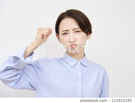 Angry woman white background 122652285