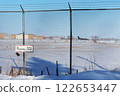 Closed area of the airport behind the fence 122653447