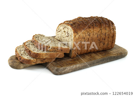 Sliced Multigrain Bread on Wooden Cutting Board Isolated on White Background 122654019