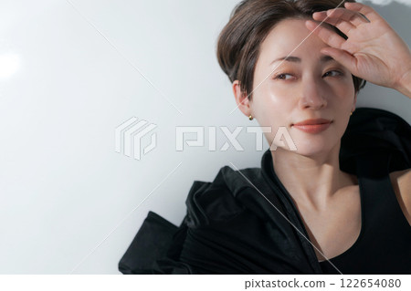 Female model in black outfit Female model in black outfit 122654080