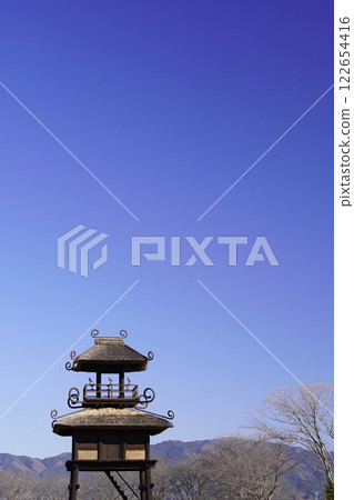 The watchtower at Karako-Kagi ruins stands out against the blue sky The watchtower at Karako-Kagi ruins stands out against the blue sky 122654416
