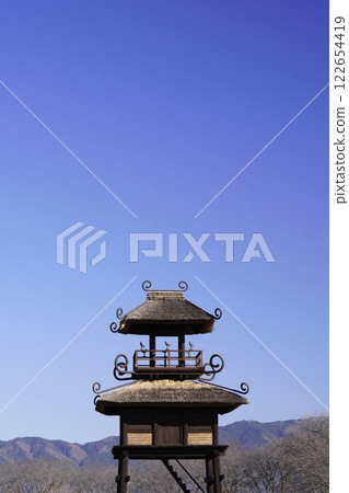 The watchtower at Karako-Kagi ruins stands out against the blue sky The watchtower at Karako-Kagi ruins stands out against the blue sky 122654419