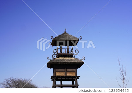 The watchtower at Karako-Kagi ruins stands out against the blue sky The watchtower at Karako-Kagi ruins stands out against the blue sky 122654425