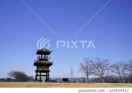 The watchtower at Karako-Kagi ruins stands out against the blue sky The watchtower at Karako-Kagi ruins stands out against the blue sky 122654427