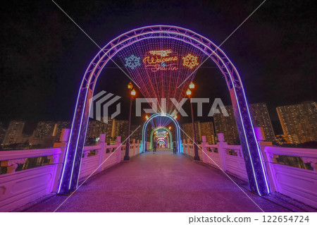 Colorful Illuminated Pedestrian Bridge Above at shing mun river Dec 17 2024 122654724