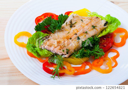 Delicious roasted juicy trout fillet 122654821