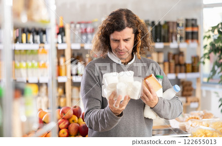 man chooses farm dairy products man chooses farm dairy products 122655013
