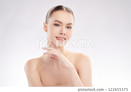 Beautiful young woman with clean fresh skin on white background, Face care, Facial treatment, Cosmetology, beauty and spa, women portrait. Beautiful young woman with clean fresh skin on white background, Face care, Facial treatment, Cosmetology, beauty and spa, women portrait. 122655373
